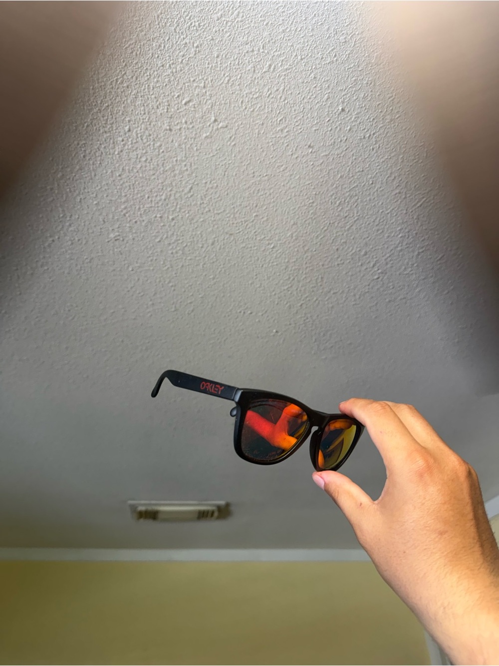 Oakley Black Sunglasses with Red Mirrored Lenses